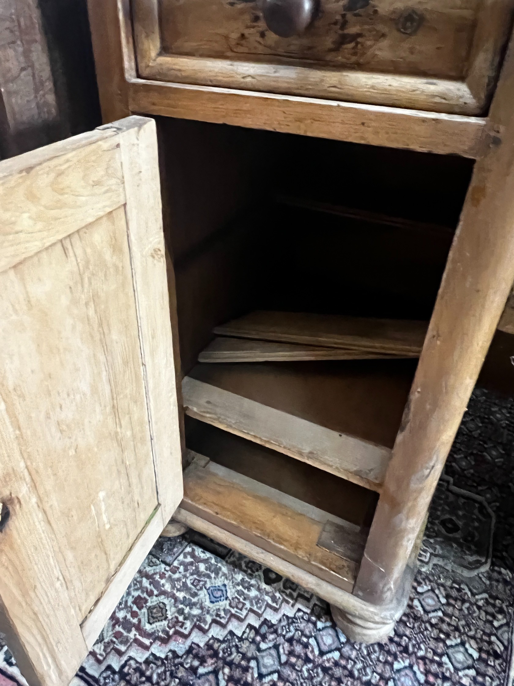 A Victorian pine inverse breakfront kneehole desk, width 119cm depth 49cm height 77cm